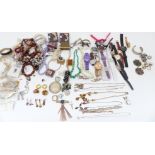 A collection of costume jewellery including watches, rings, Miracle pendants, necklace including