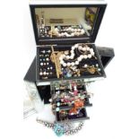 A collection of silver and costume jewellery including Rado beads, earrings, necklaces including