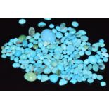 A collection of loose turquoise cabochons including heart cut examples, 15g