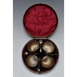 Cased Victorian set of four hallmarked silver shell shaped salts, Birmingham 1875, maker's mark