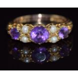 A 9ct gold ring set with an amethyst and pearls, 3.7g, size O