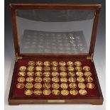 Cased set of gold plated bronze medallions "The World's Greatest Sculptures", in glazed display