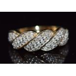 A 9ct gold ring set with diamonds, 2.7g, size K