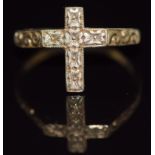 A 9ct gold ring in the form of a cross, with engraved decoration, 1.7g, size P