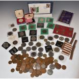 A collection of UK crowns including two cased silver examples, Isle of Man, sundry coins, cased sets