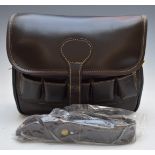 Brown leather shotgun cartridge loader's bag with extra large capacity, new and unused.