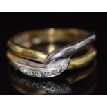 A 9ct bi-coloured gold ring set with diamonds in a twist setting, 3.9g, size K