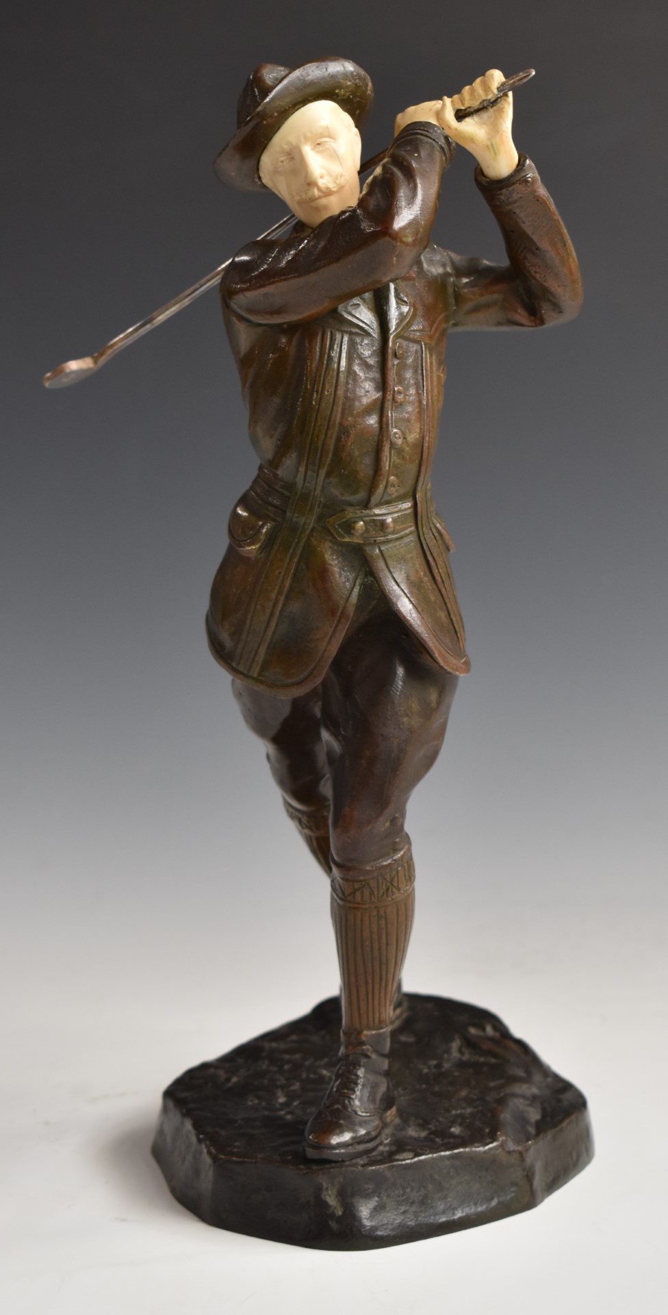 Early 20thC bronze and ivory figure of an Austrian or similar gentleman golfer in the manner of