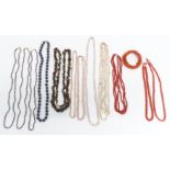 Three coral necklaces, a coral bracelet, necklaces including pearl, tourmaline, etc