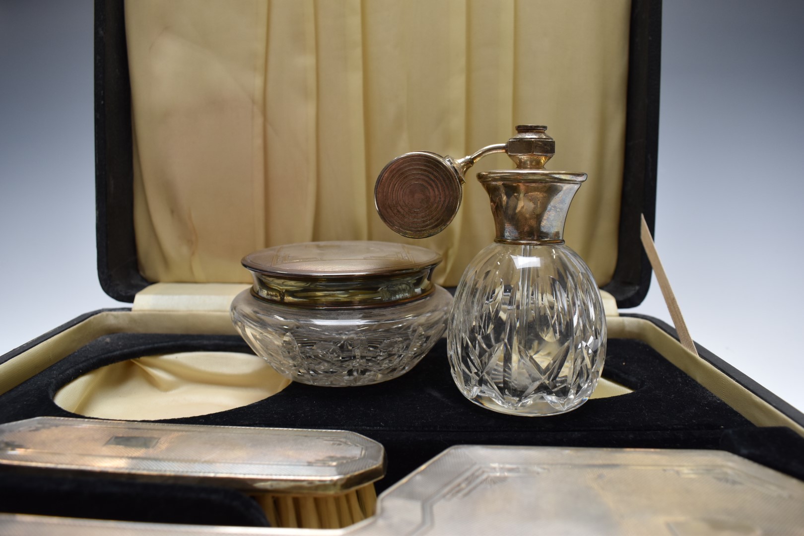 Cased Art Deco hallmarked silver mounted dressing table set comprising hand mirror, two brushes - Image 3 of 5