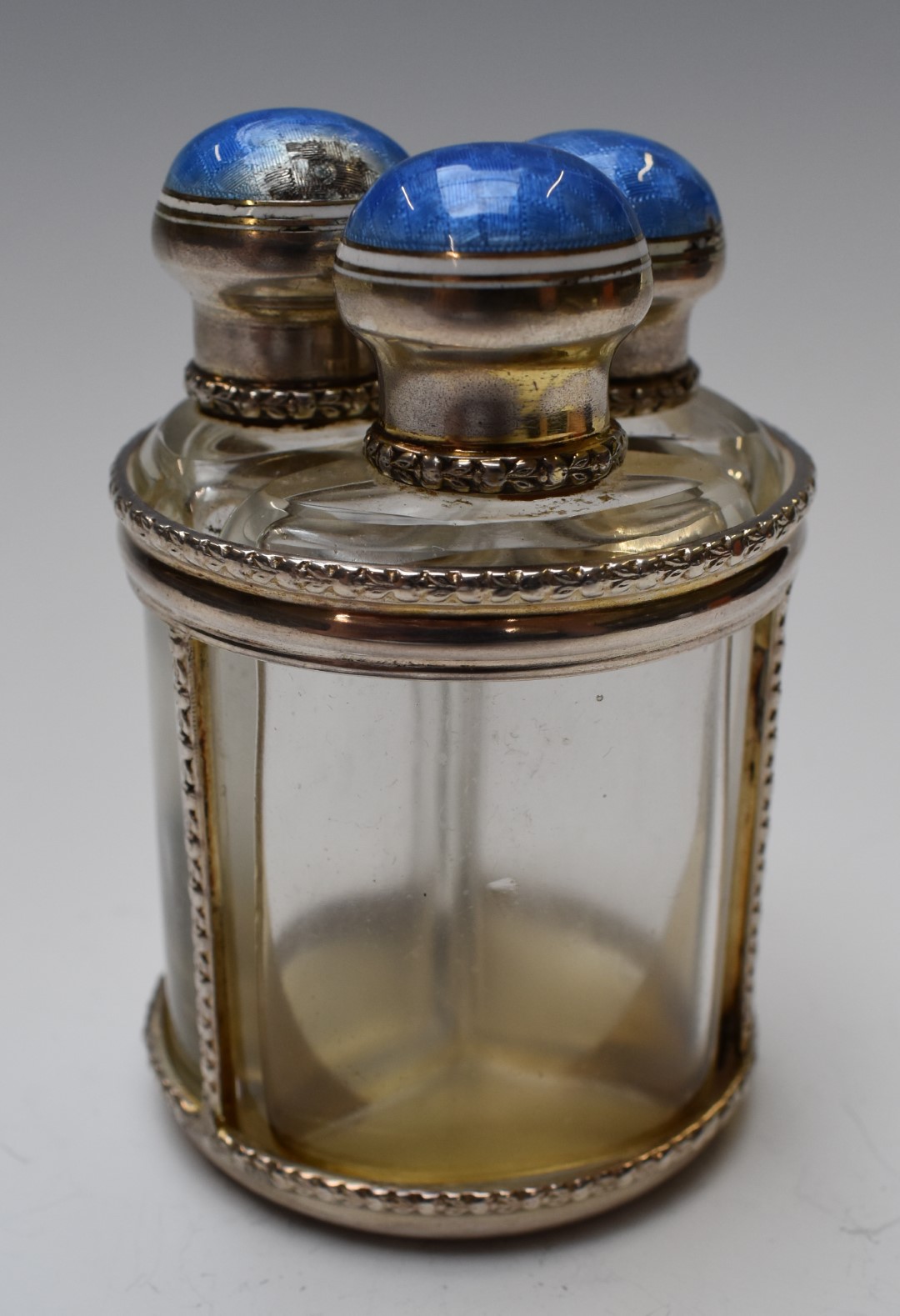 George V hallmarked silver and guilloché enamel three bottle scent bottle set, Birmingham 1912, - Image 2 of 5