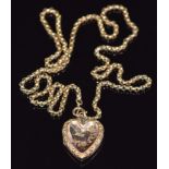 A 9ct gold necklace made up of faceted links and a 9ct back and front heart locket with swallow