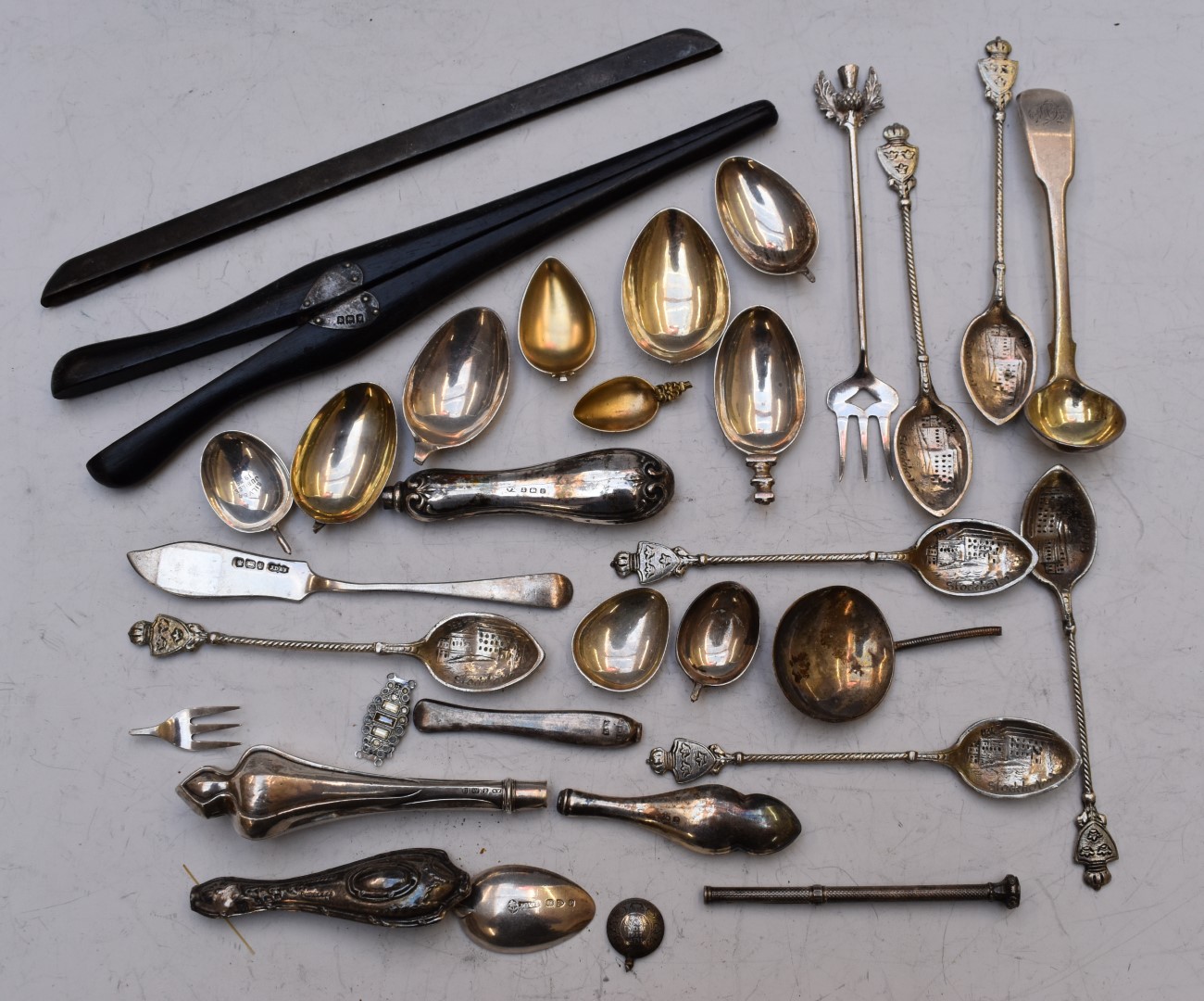 Hallmarked silver and white metal spoons, spoon bowls and a comb back, weight 162g, together with