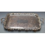 Large silver plated twin handled tray with pierced ridge and fruit and vine decoration raised on