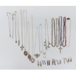 A collection of silver jewellery including necklaces, earrings, etc