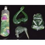 A nephrite jade Maori tiki, nephrite jade pendant, a nephrite jade pendant in the form of a kiwi and
