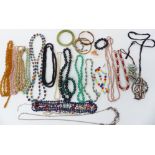 A collection of beaded necklaces including pearl, bloodstone and vintage examples, a hardstone