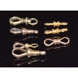 Eight yellow metal and 9ct gold clips, 9.3g