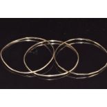 Three 9ct gold bangles, 11.6g