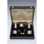 Cased George VI hallmarked silver cruet set comprising two open salts, two peppers, mustard and