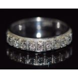 An 18ct white gold half eternity ring set with diamonds, 3.5, size M/N