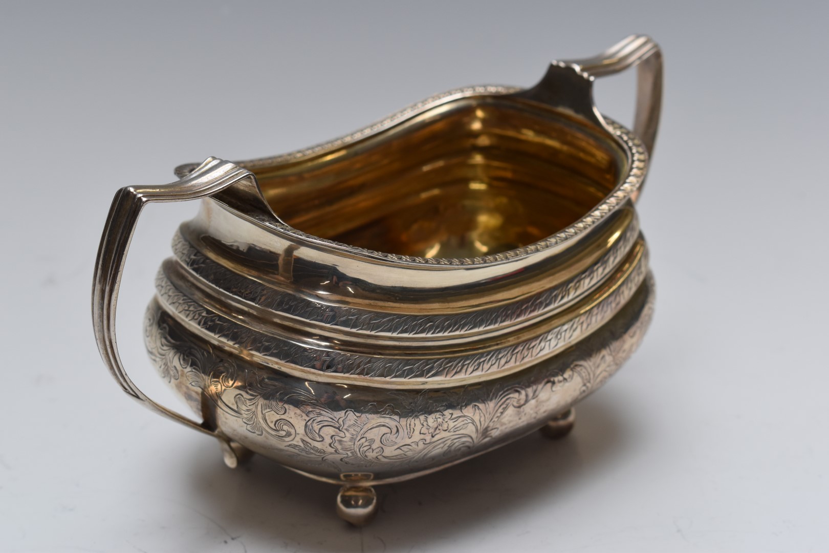 Georgian white metal sugar bowl with gilt wash interior, engraved decoration and twin handles, width - Image 3 of 3