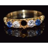 An 18ct gold ring set with a sapphire and diamonds, 2.8g, size N