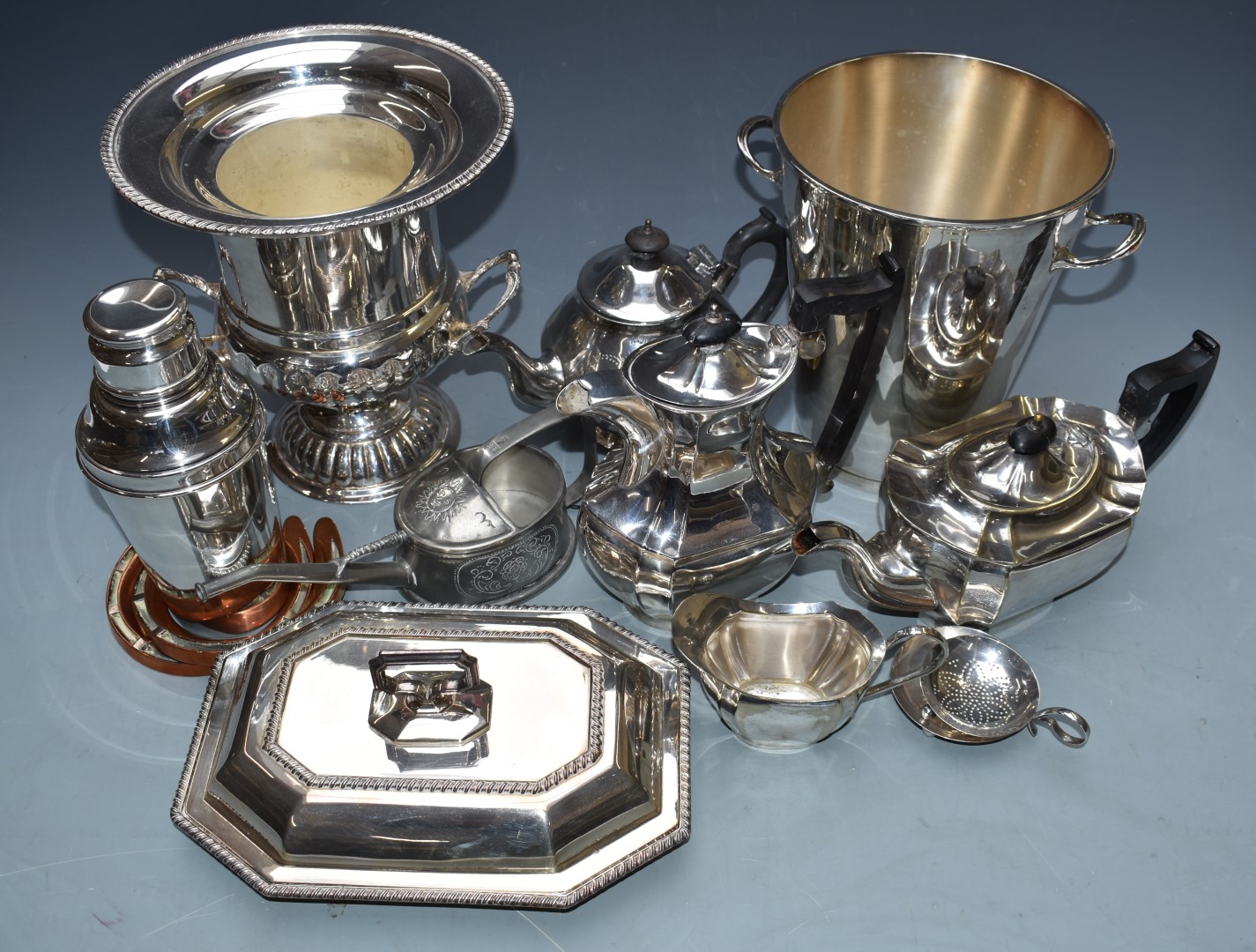 Silver plated ware including two champagne buckets (height of taller 26cm), two cocktail shakers,