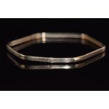 A 9ct gold octagonal bangle, 4.6g