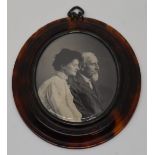 A tortoiseshell carved miniature photograph or portrait frame, overall height 9.5cm