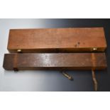 Two vintage wooden gun cases, both with fitted interiors, largest 105x26x10cm.