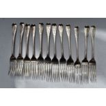 Twelve Georgian and early Victorian hallmarked silver dessert forks, with bright cut decoration,