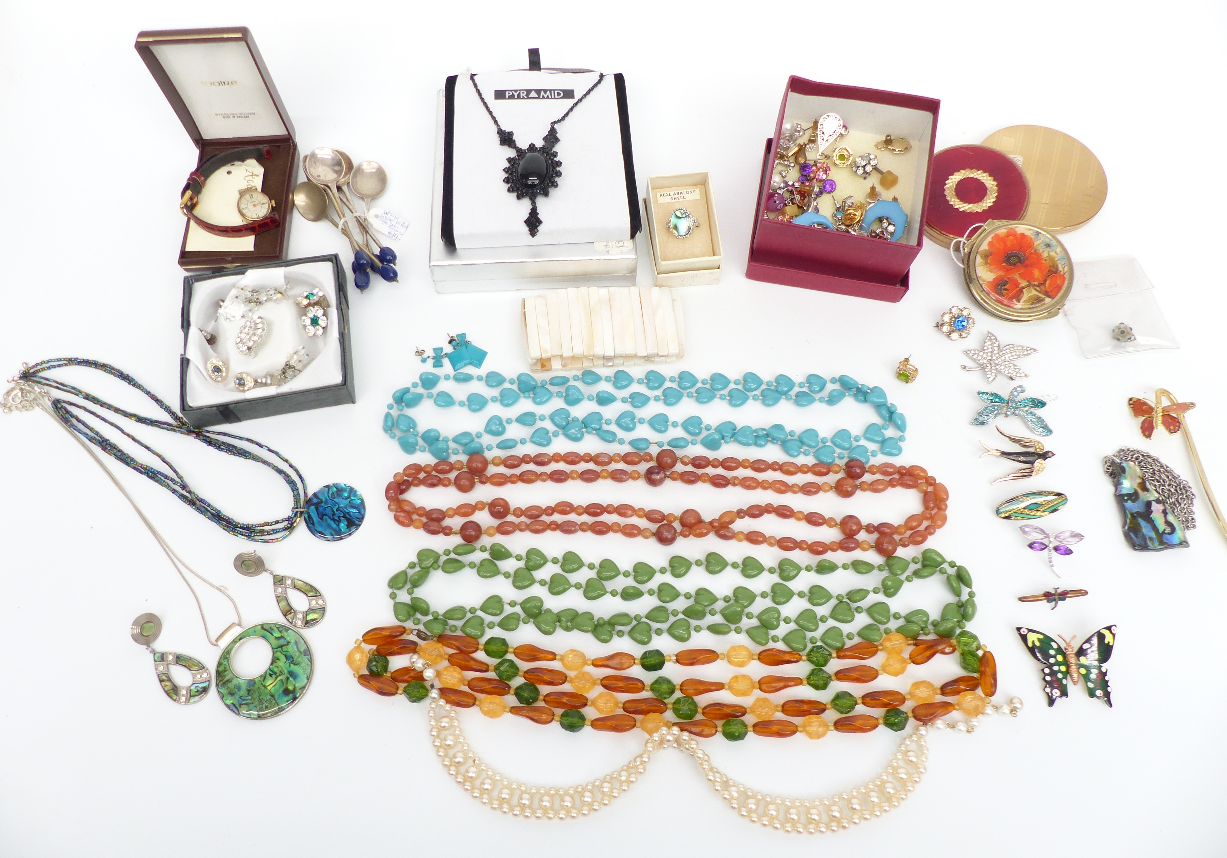 A collection of jewellery including earrings, necklaces, brooches, etc