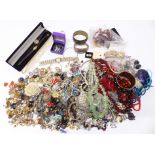 A collection of costume jewellery including earrings, necklaces, etc
