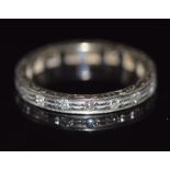 An 18ct white gold eternity ring set with diamonds, 2.8g, size M