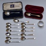 Twelve hallmarked silver teaspoons including set of six and set of five, hallmarked silver napkin