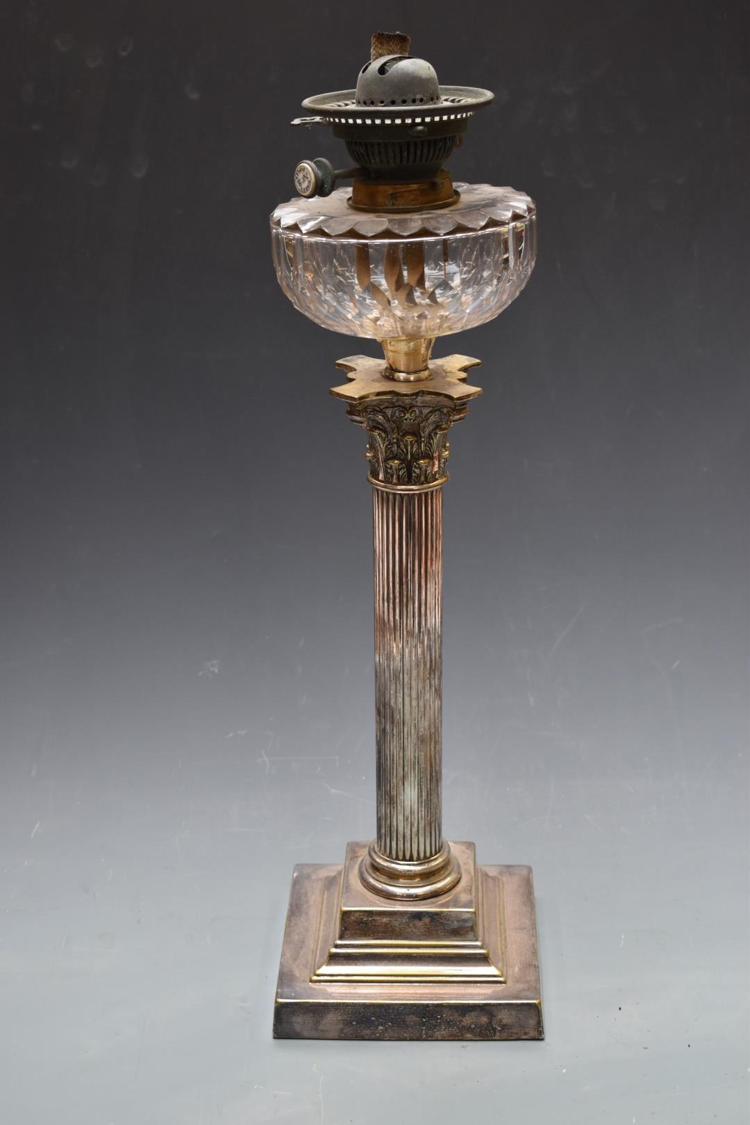 Silver plated Corinthian column oil lamp with cut glass reservoir and Hink's no 2 Patent Burner,