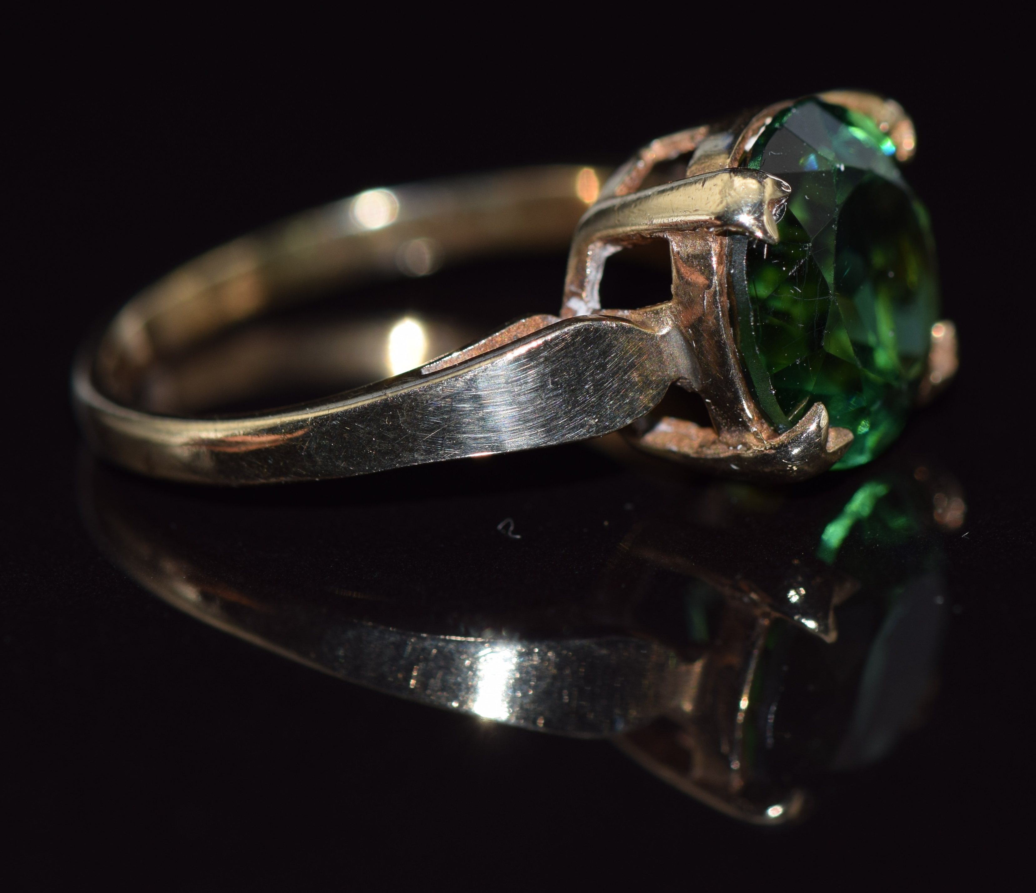 A 9ct gold ring set with a round cut green topaz, 2.9g, size L - Image 2 of 2