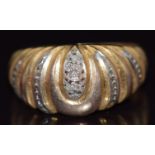 A 9ct gold ring set with diamonds, 2.7g, size P