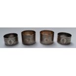 Two pairs of hallmarked silver napkin rings, one pair being Victorian, weight 133g