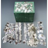 A large amateur collection of UK coinage in a modern wooden collector's cabinet, includes