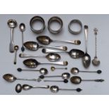 Hallmarked silver and white metal tea and other spoons and three napkin rings, Georgian and later,