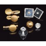 An 18ct gold stud set with mother of pearl and a sapphire (1.4g), a 9ct gold cufflink set with