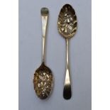 Pair of Georgian hallmarked silver gilt berry spoons, London 1782 and 1789, maker's marks rubbed,