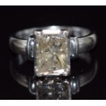 An 18ct white gold ring set with an emerald cut diamond of approximately 3.2ct, size M, 7.5g