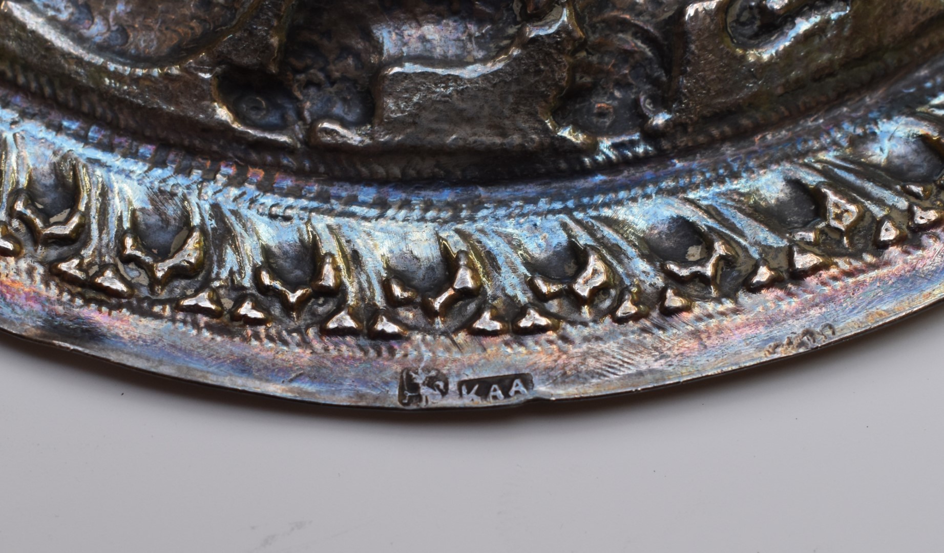 Sri Lanka white metal dish with embossed decoration of animals, marked KAA for Kandyan Arts - Image 3 of 3