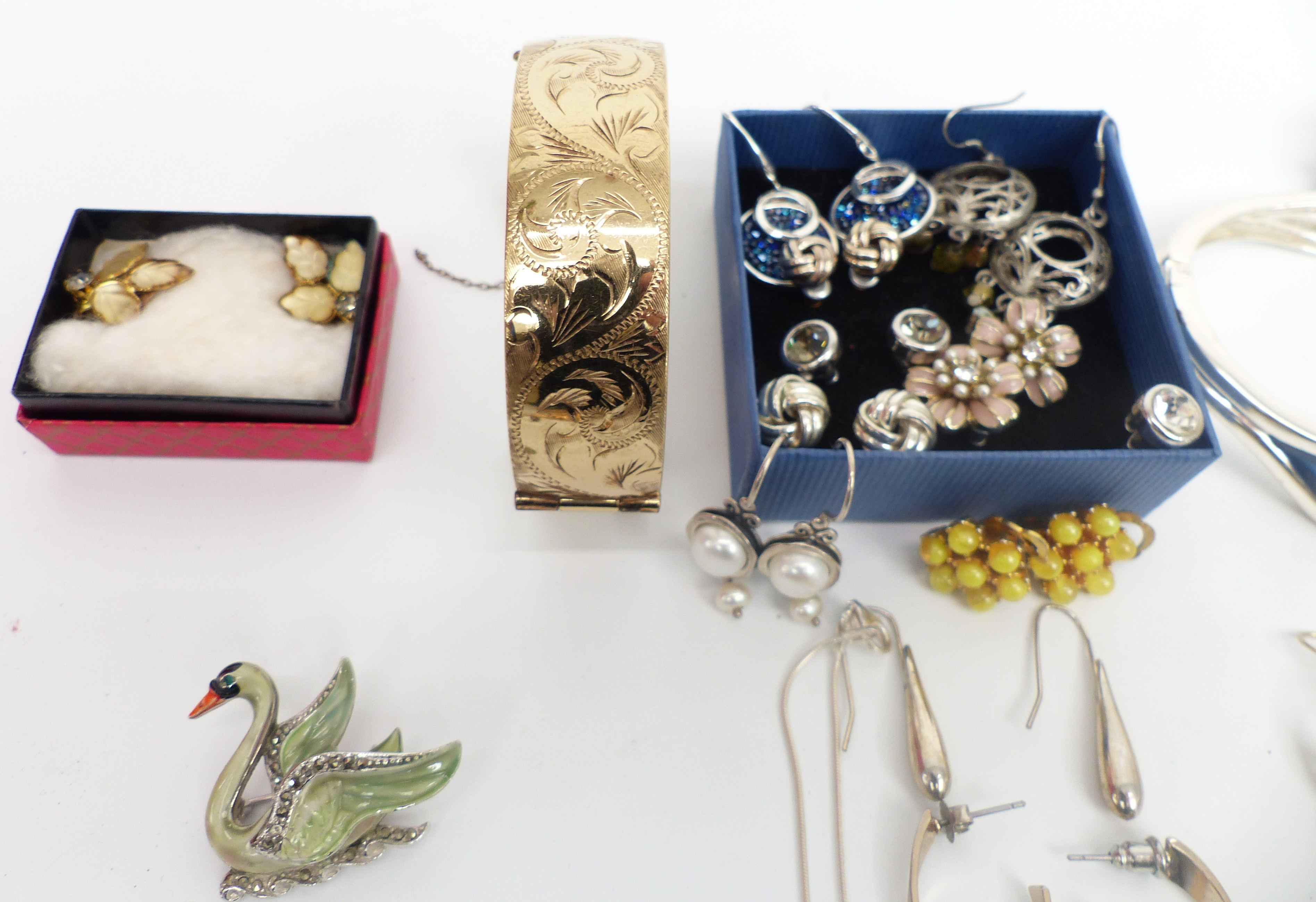 A collection of costume jewellery including necklaces, enamel and marcasite brooch, earrings, rolled - Image 2 of 4