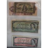 An album containing a collection of world banknotes, early 20thC onwards
