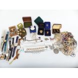 A collection of costume jewellery including necklaces, brooches, silver necklace and earrings,