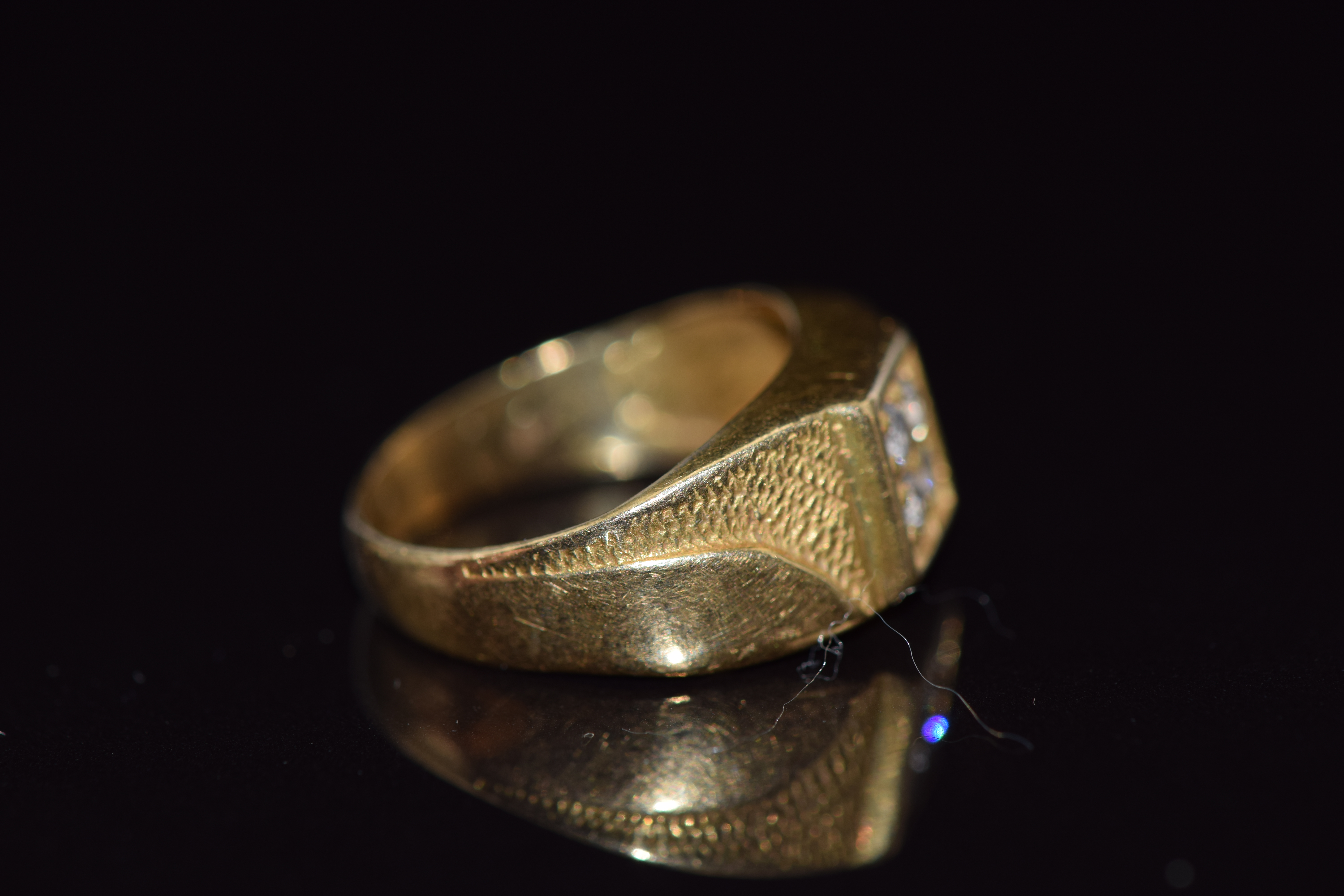 A yellow metal ring set with four diamonds, 3.7g, size I - Image 2 of 2